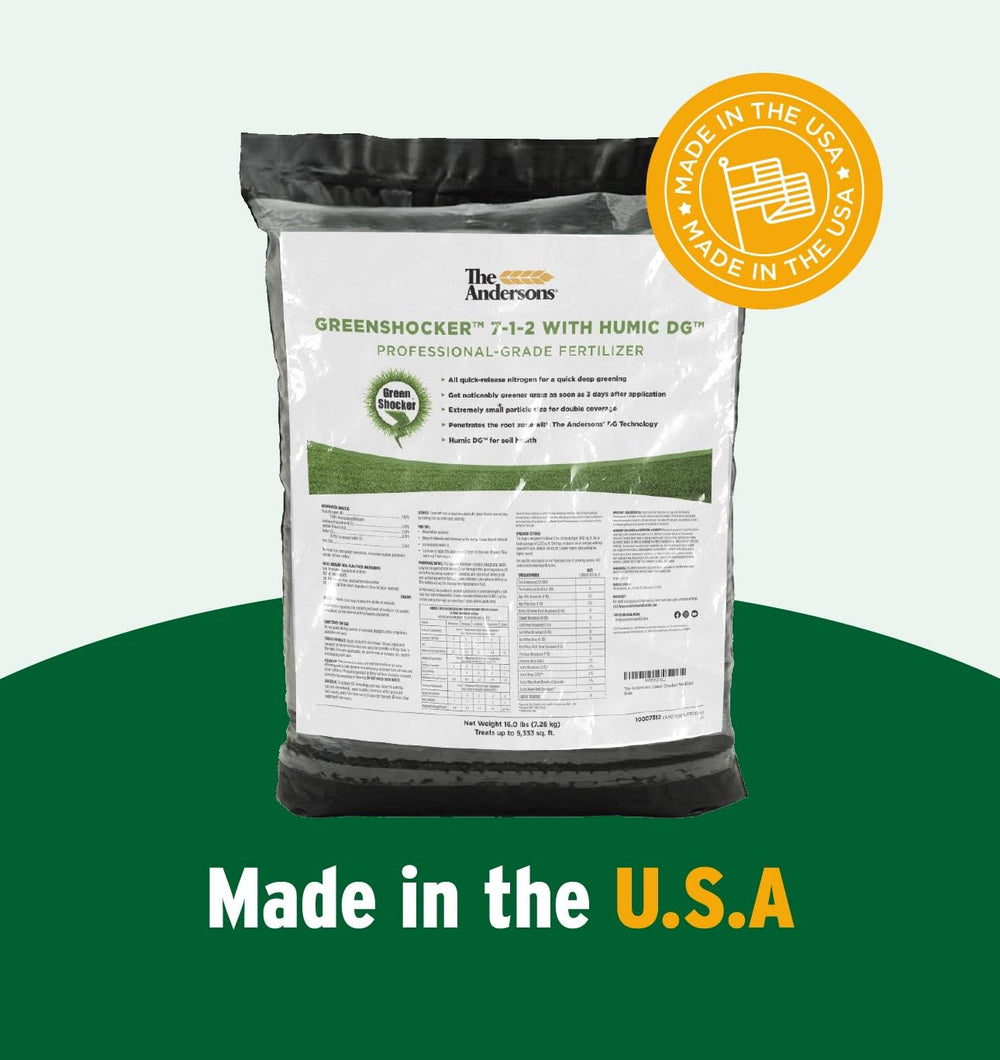 Hand holding The Andersons granules to show fine texture and precise application