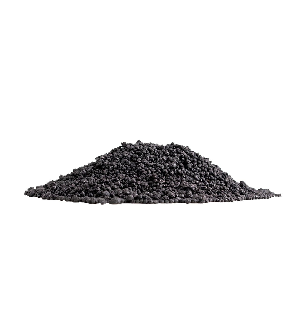 Close-up of Humic DG granular texture from The Andersons, highlights concentrated humic particles for microbial feeding