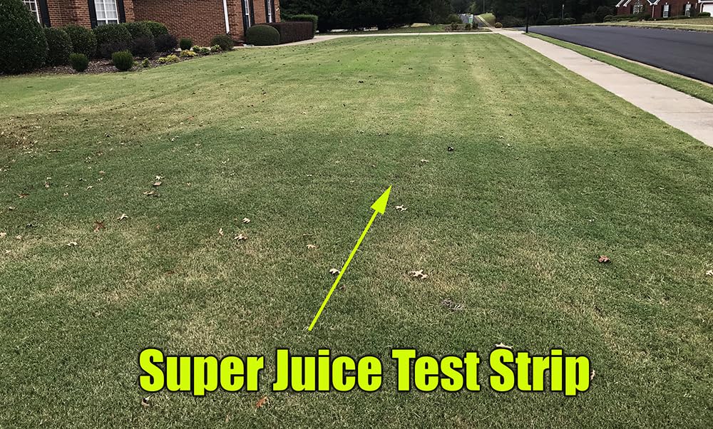 Professional applying The Andersons Super Juice to turf for even coverage and rapid greening
