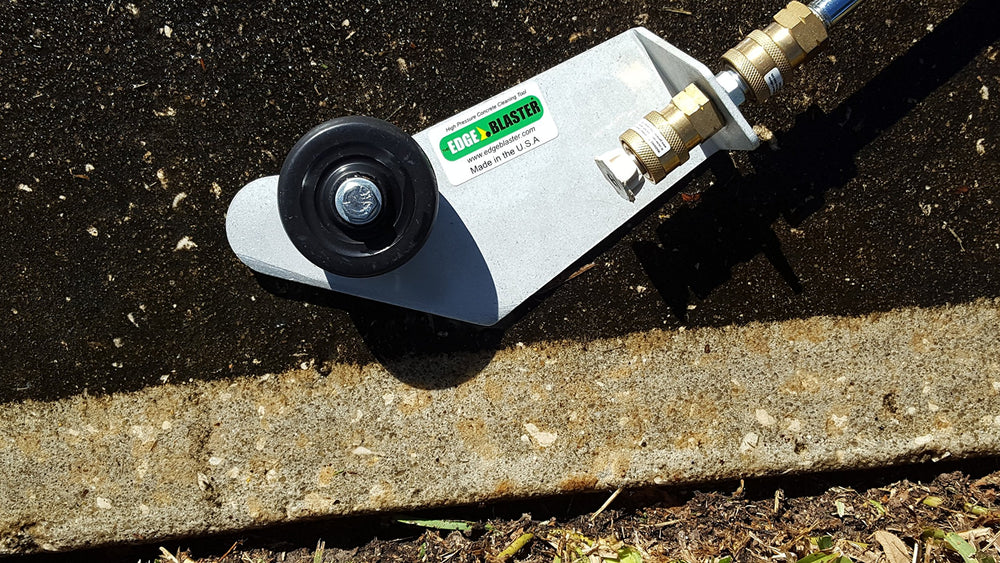 THE EDGE BLASTER cleaning a driveway edge demonstrating precise targeted cleaning
