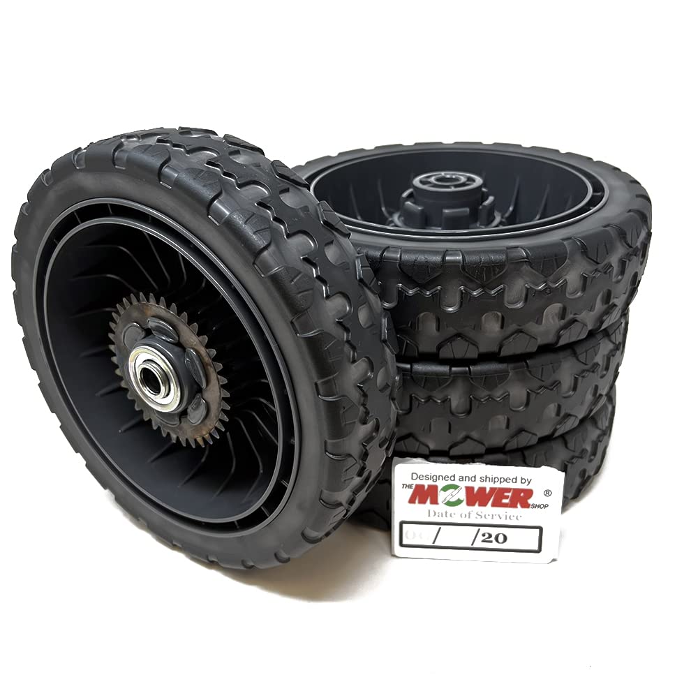 The Mower Shop rear drive wheel close-up showing durable tread detail