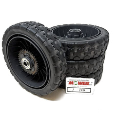 The Mower Shop rear drive wheel close-up showing durable tread detail