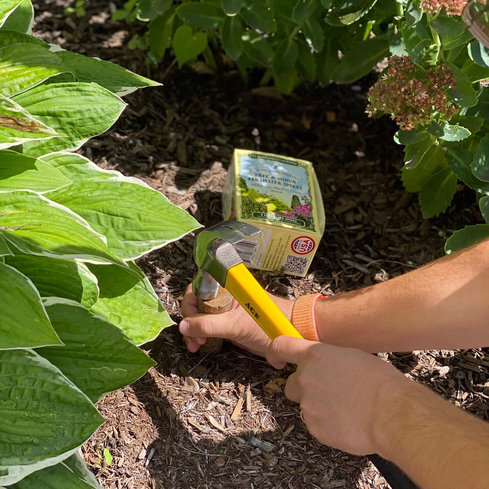 The Old Farmer's Almanac spikes used in landscaped yard benefit: tidy application and healthier plants