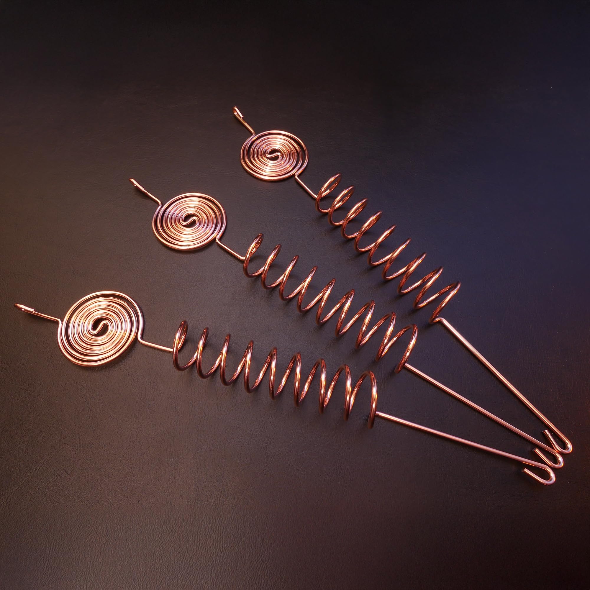 Weathered patina on Thrive Garden copper coil indicating long-term outdoor resilience