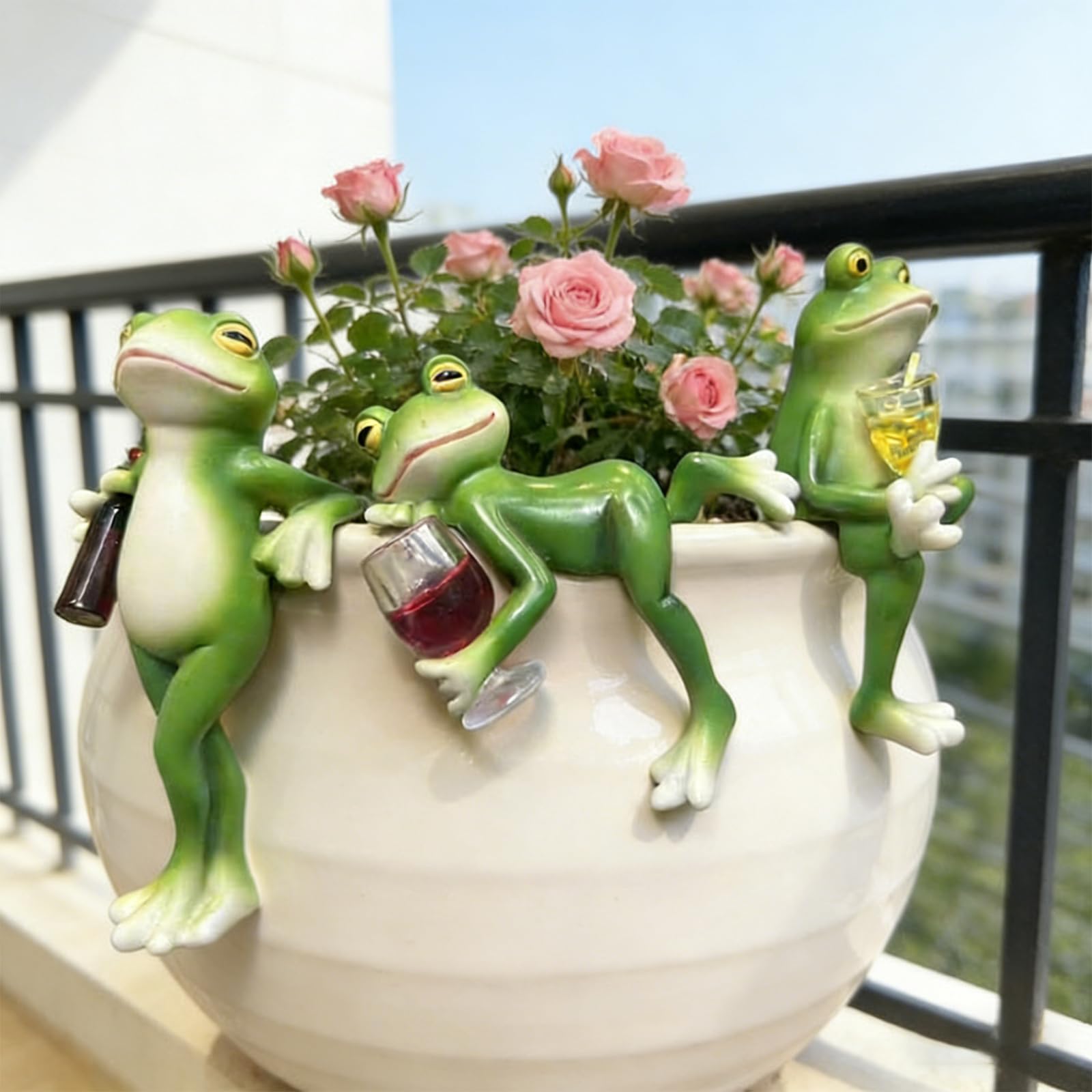 Thryonaxus front view of three frogs showing whimsical bottle huggers and visual charm