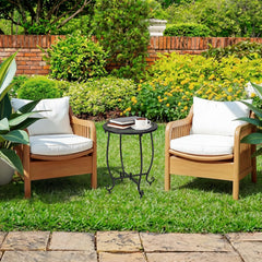 Thyle table in use beside chair demonstrating stable, reachable surface for beverages