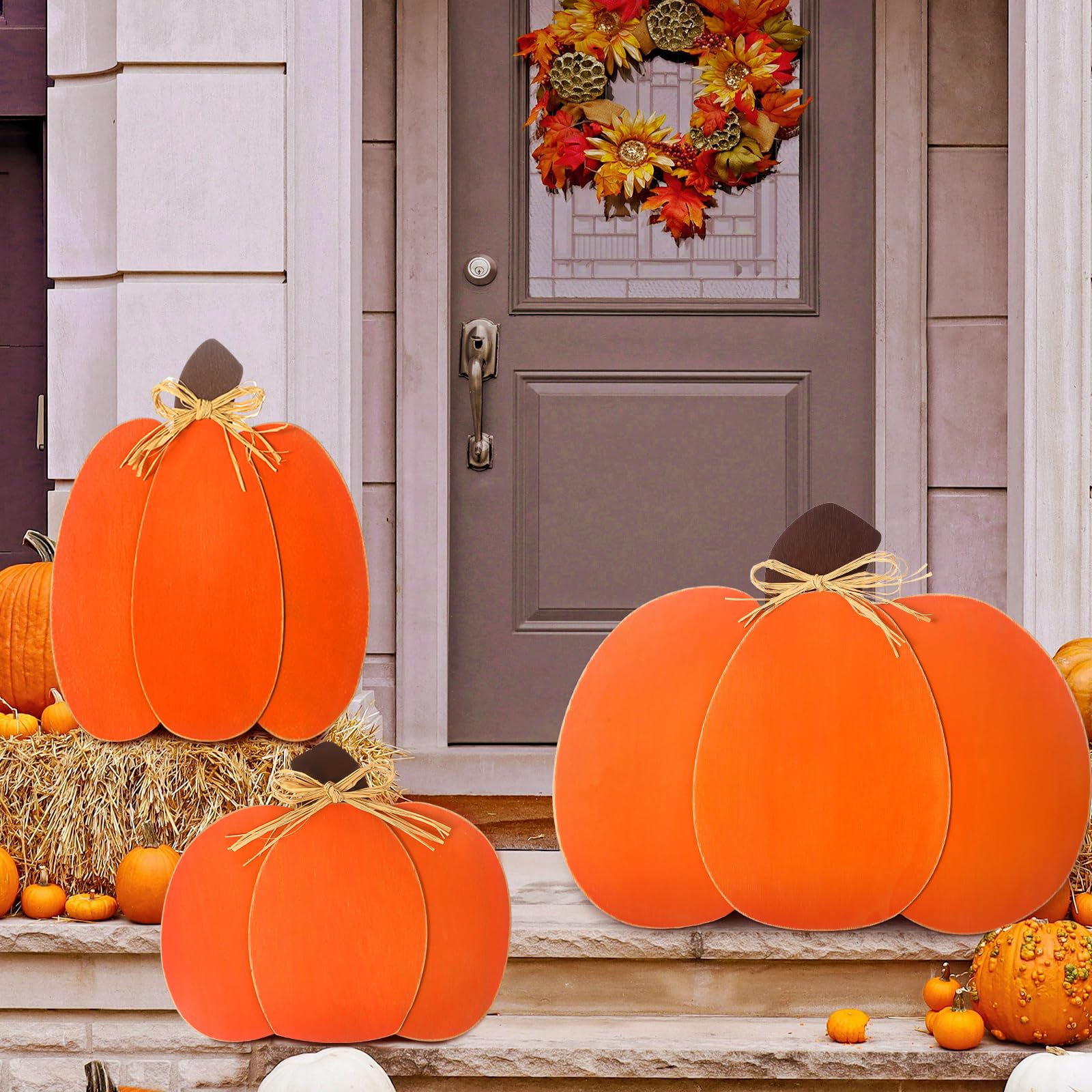 Thyle front view of three wooden pumpkins adds instant fall curb appeal