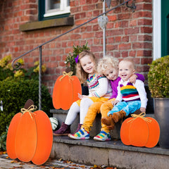 Thyle pumpkins beside ruler showing sizes for porch and tabletop planning