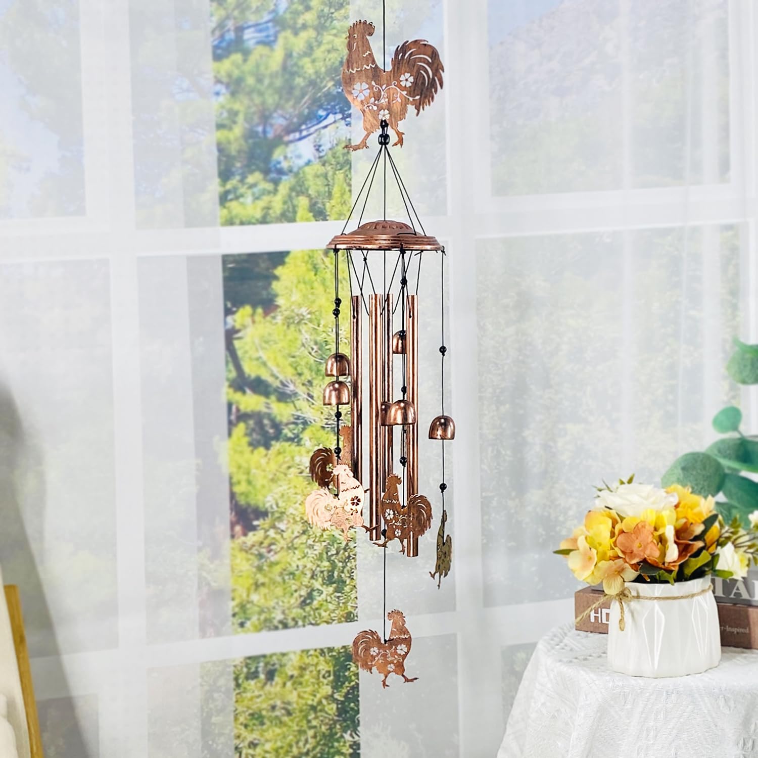 TIGGSY wind chime in a garden setting adding charming decor and soft melodic background