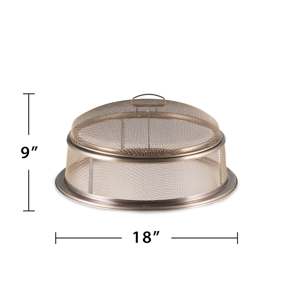 TIKI screen hung on fire pit rim demonstrating easy access and control