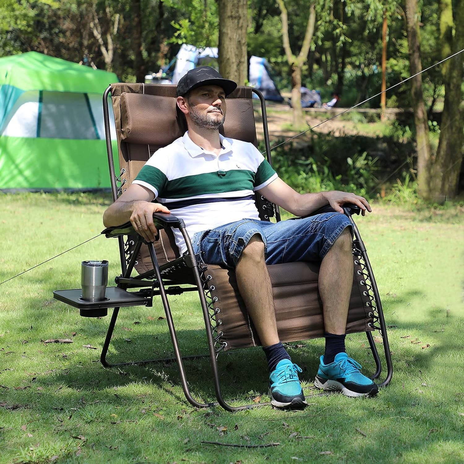 TIMBER RIDGE chair next to standing person showing generous size and scale