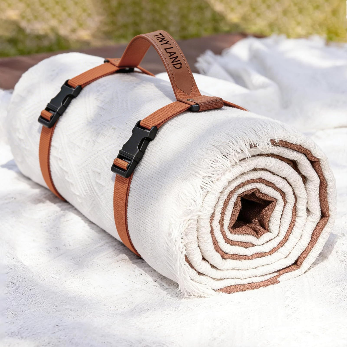 Tiny Land front view showing full open blanket and modern design benefit