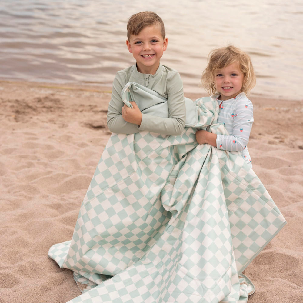 Tiny Twinkle folded with handle and strap for compact, easy transport