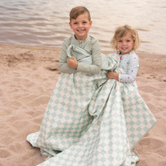 Tiny Twinkle folded with handle and strap for compact, easy transport