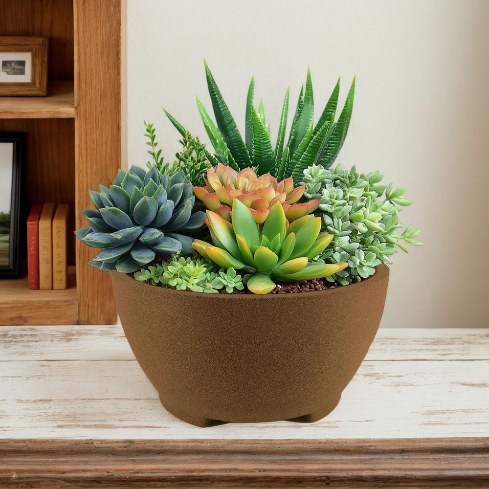 TINYVISTA pot beside a hand for scale demonstrating 8.26-inch size suitability