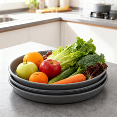 TITE plant saucer in use on patio protecting decking from water and soil stains