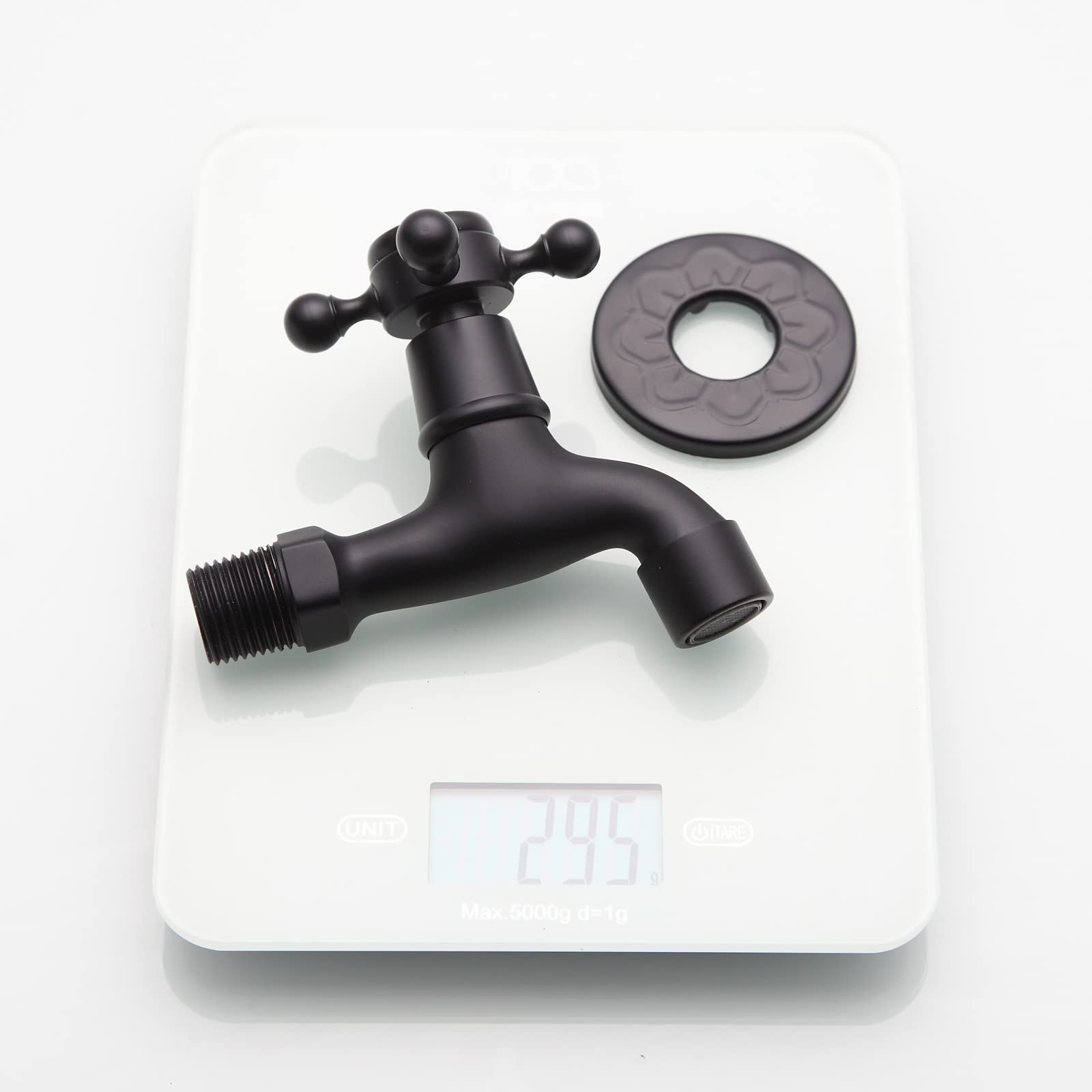 TOLIWEL faucet held in hand showing compact scale and build quality