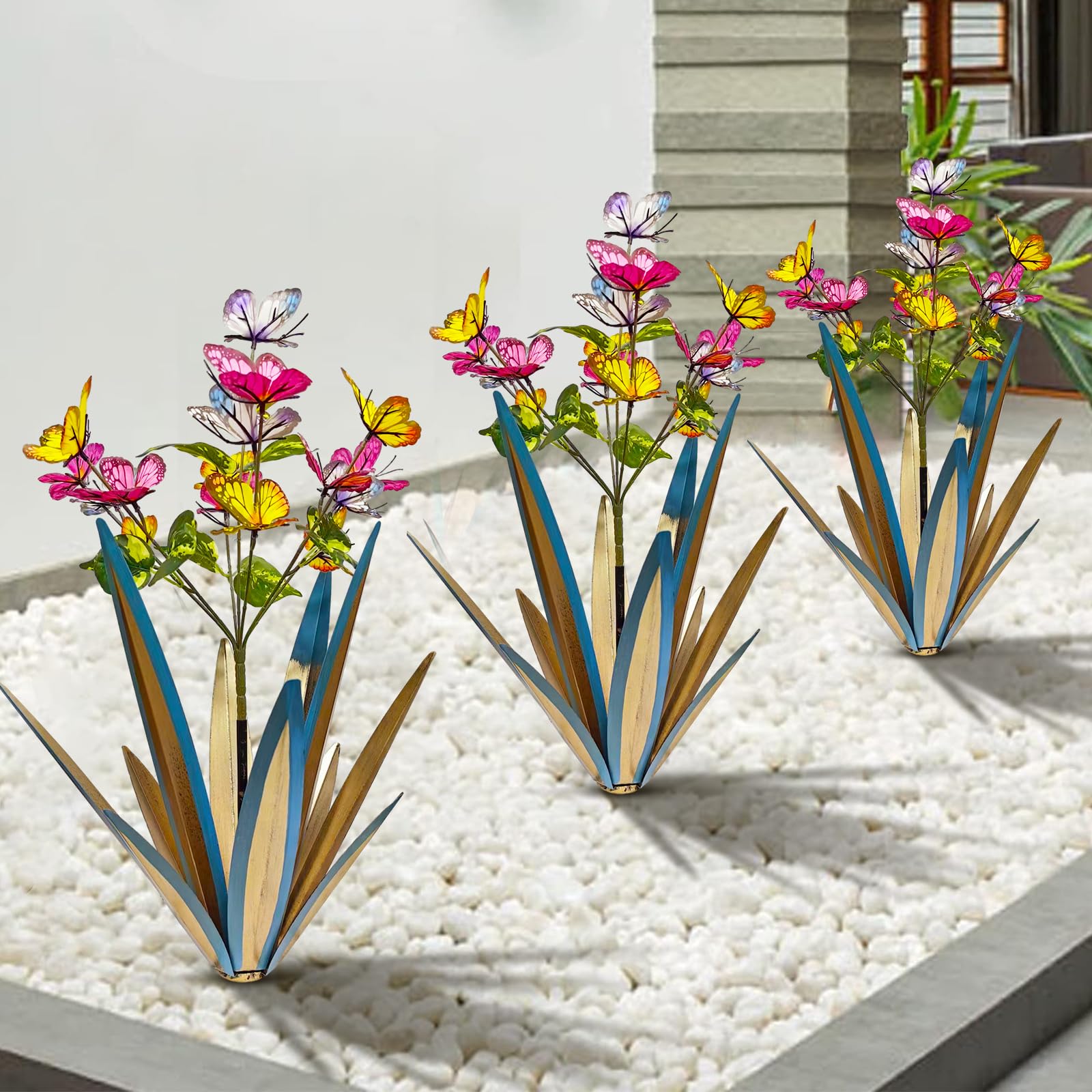 TOMBABY butterflies placed in planter adding instant color and low-maintenance charm