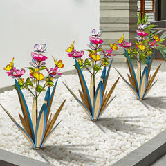 TOMBABY butterflies placed in planter adding instant color and low-maintenance charm