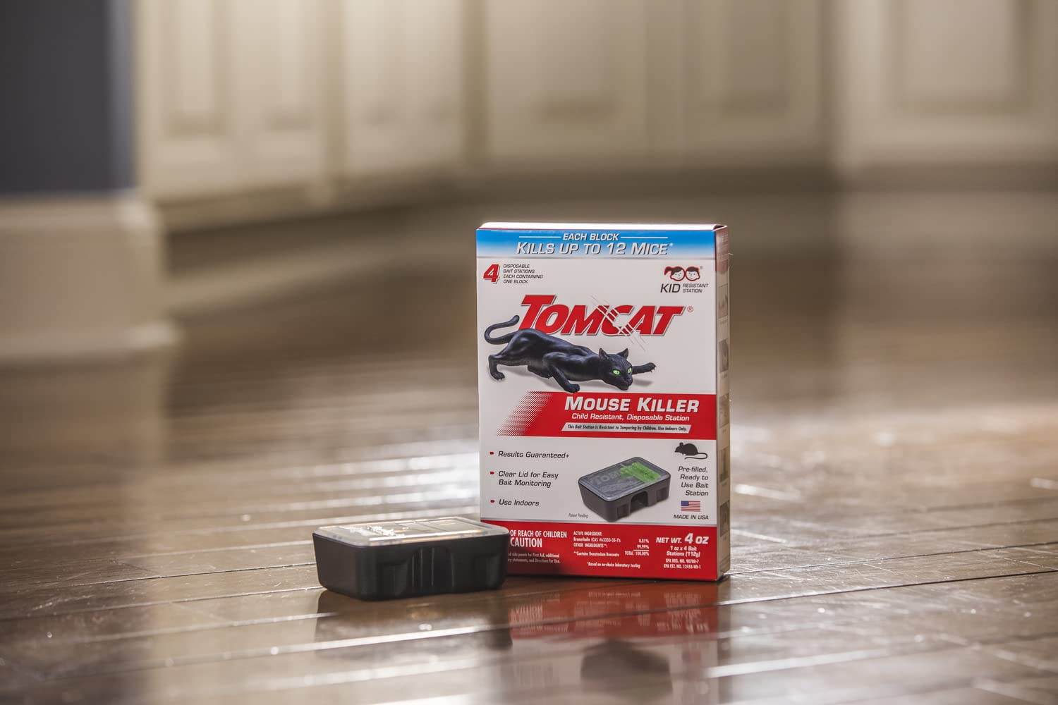 Tomcat station in hand for scale to illustrate compact, space-saving size