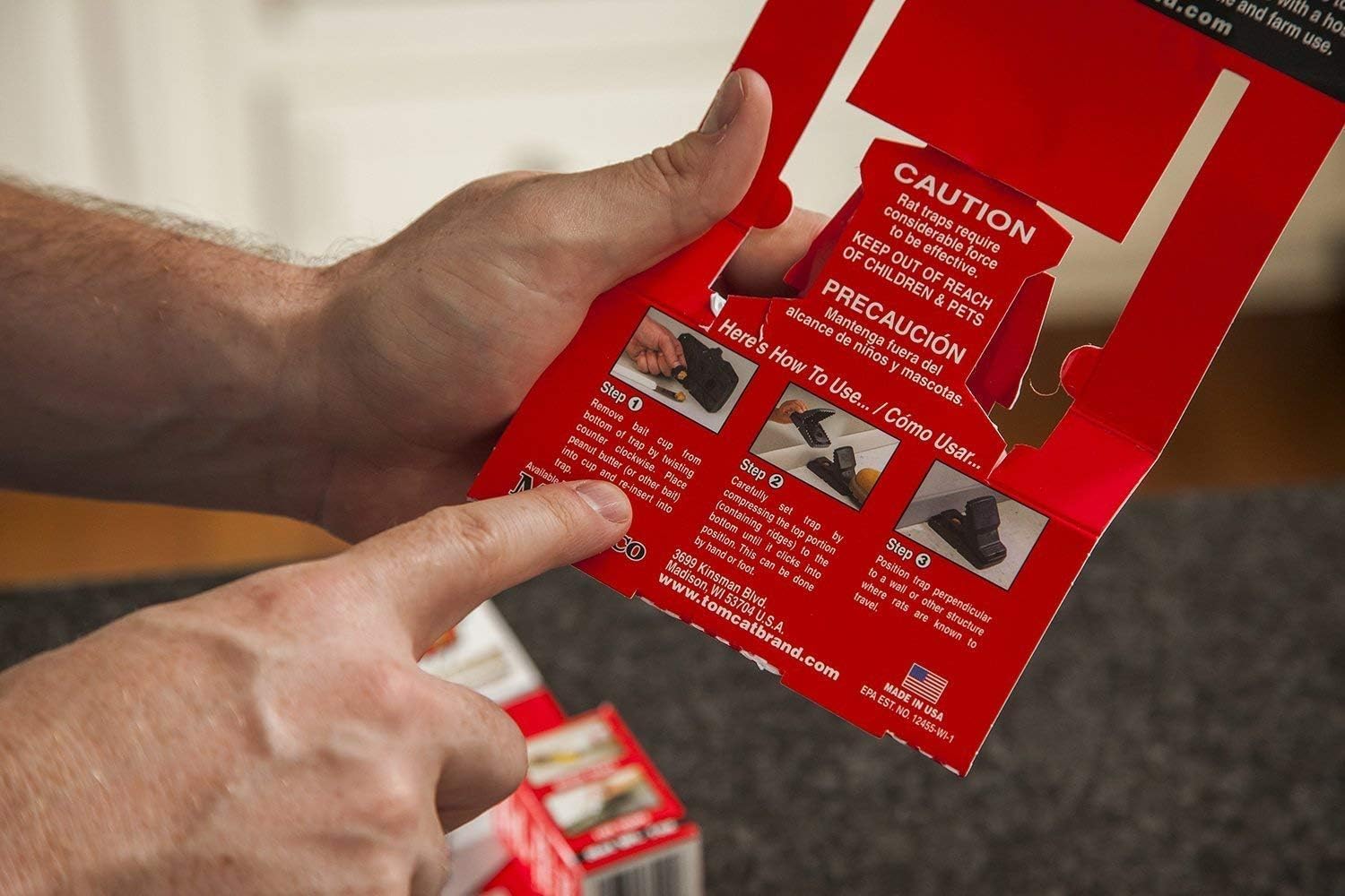 Tomcat trap inside bait station protecting pets and increasing safety
