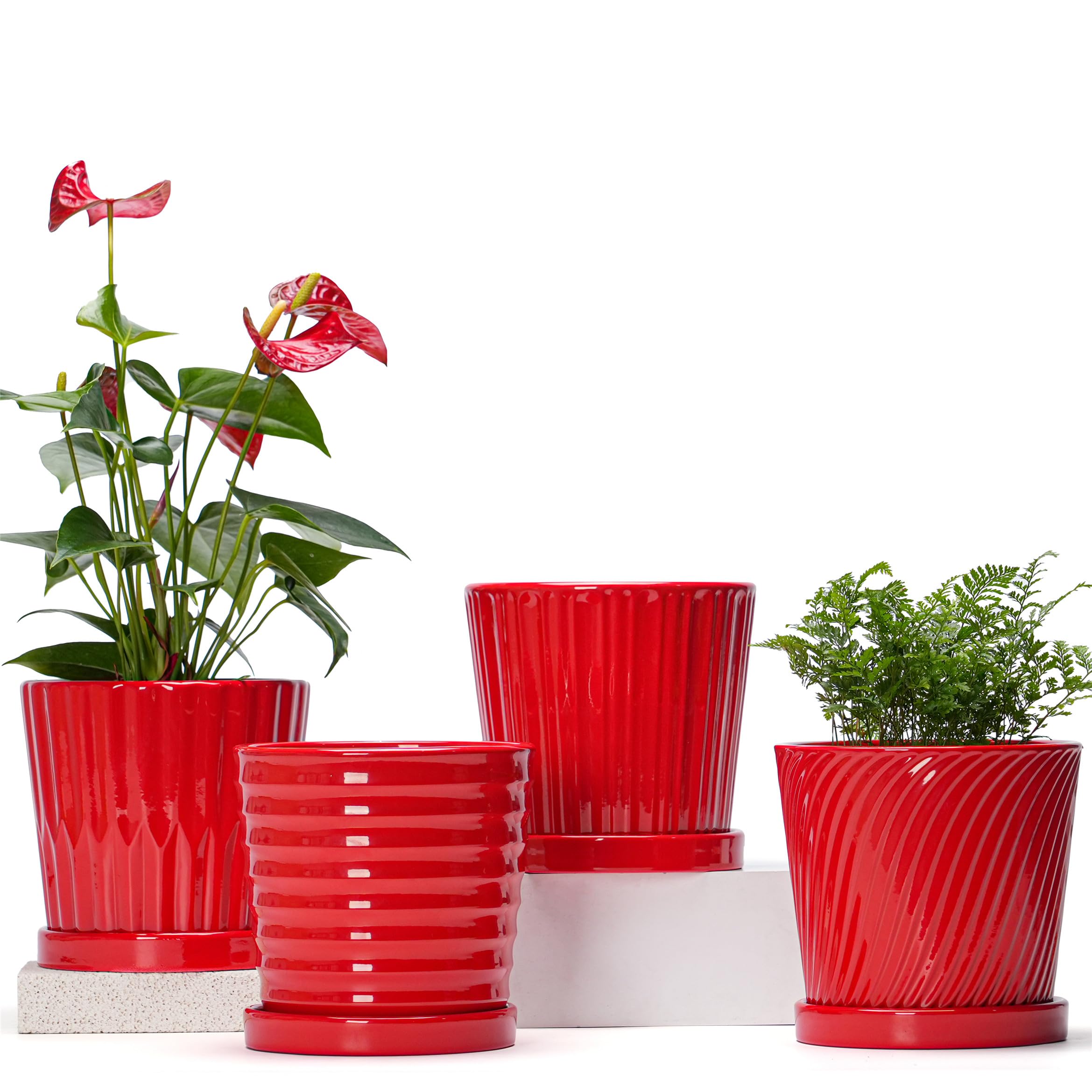 Ton Sin front view of four ceramic pots showing embossed patterns and coordinated style