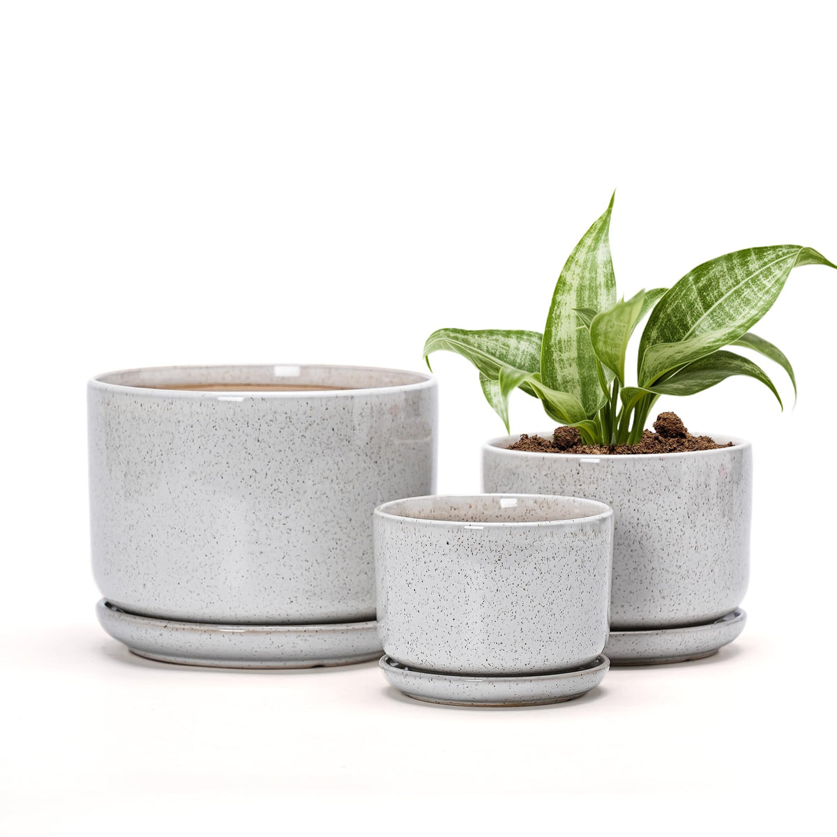 Ton Sin front view of three reactive-glaze white ceramic planters showing sizes and saucers for neat watering