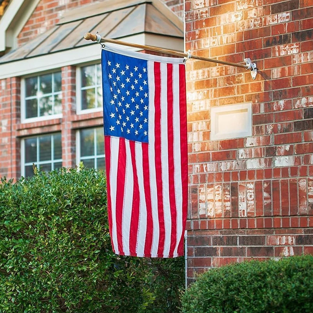 TOOUP flag attached to a vehicle flagpole for portable display during travel