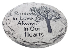 Top Brass close-up of Tree of Life detail and 'Rooted in Love' inscription highlighting craftsmanship and clarity