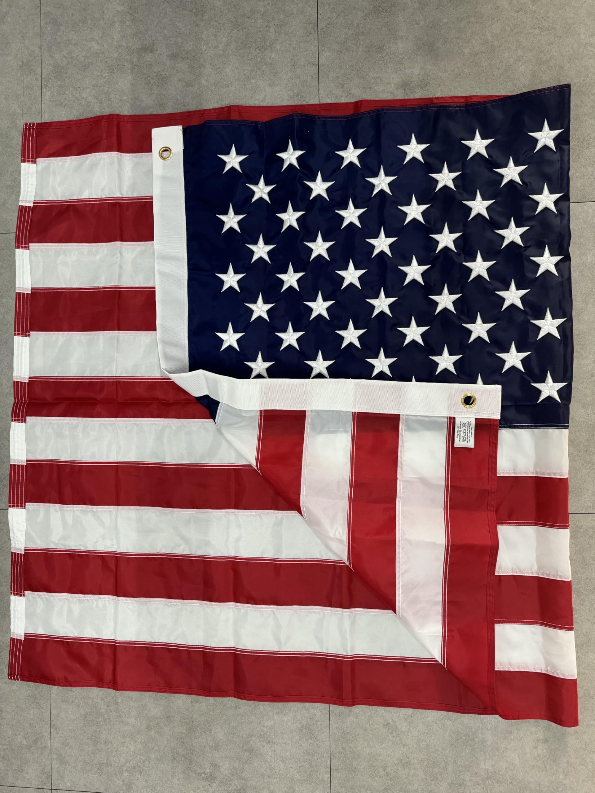 TOPFLAGS flag in a yard during a holiday display for patriotic presentation
