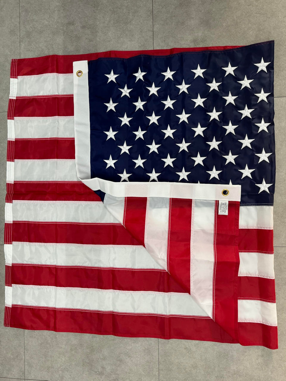 TOPFLAGS flag in a yard during a holiday display for patriotic presentation