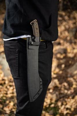 Tops El Chete next to measuring tape showing 17.5 inch overall size for fit planning