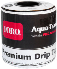 Toro Aqua-Traxx front view showing tape spool and labeling, highlights reliable long-run irrigation