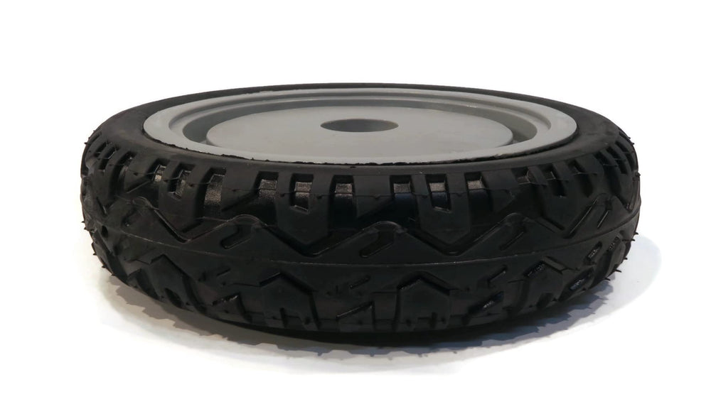 Toro rear wheel size comparison with ruler for correct part verification