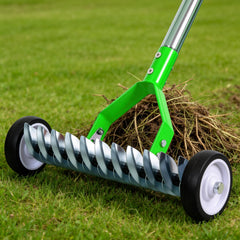 Torquen rake front view showing dual-sided head and green finish for versatile dethatching