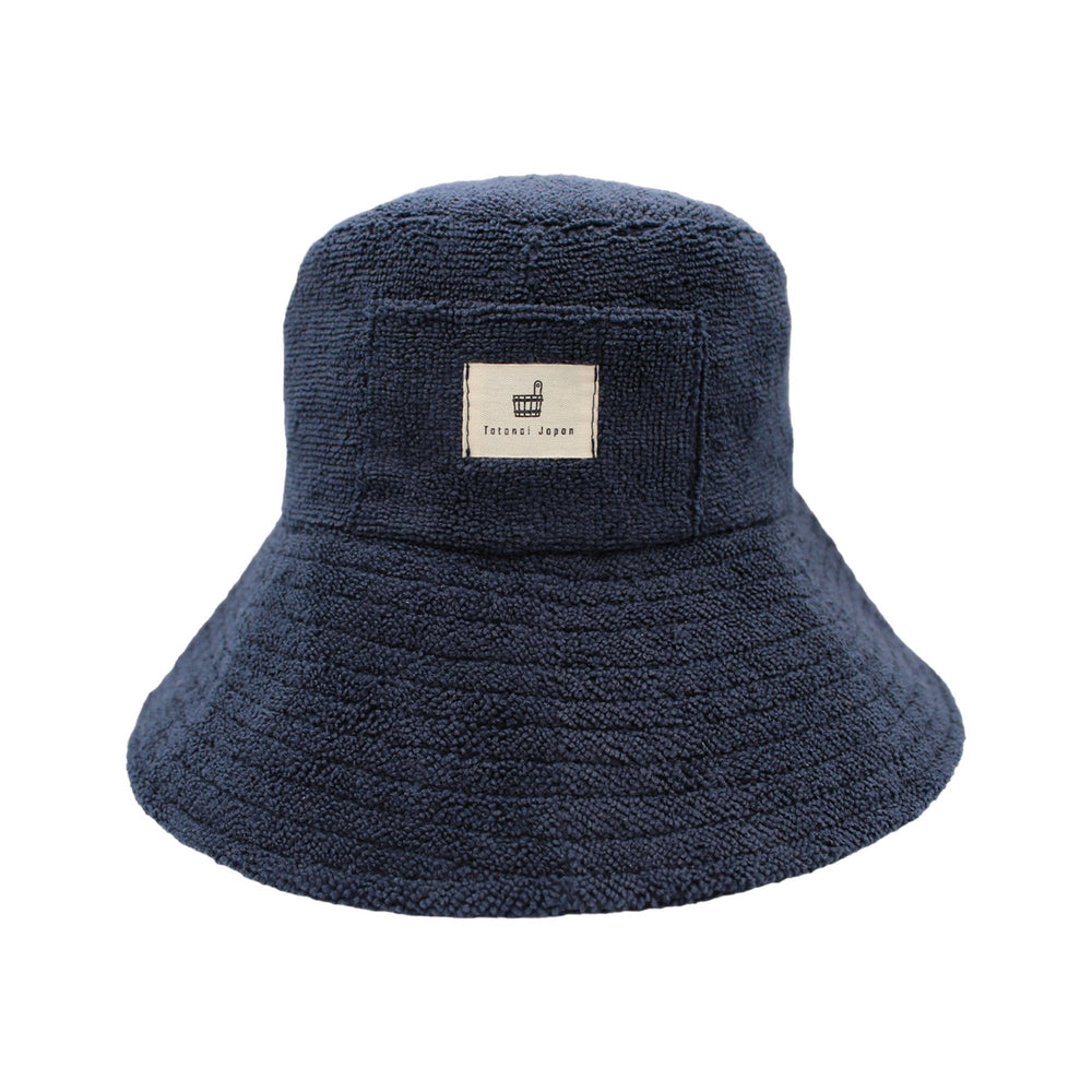 Totonoi Japan navy sauna hat front view showing fit and brim benefit