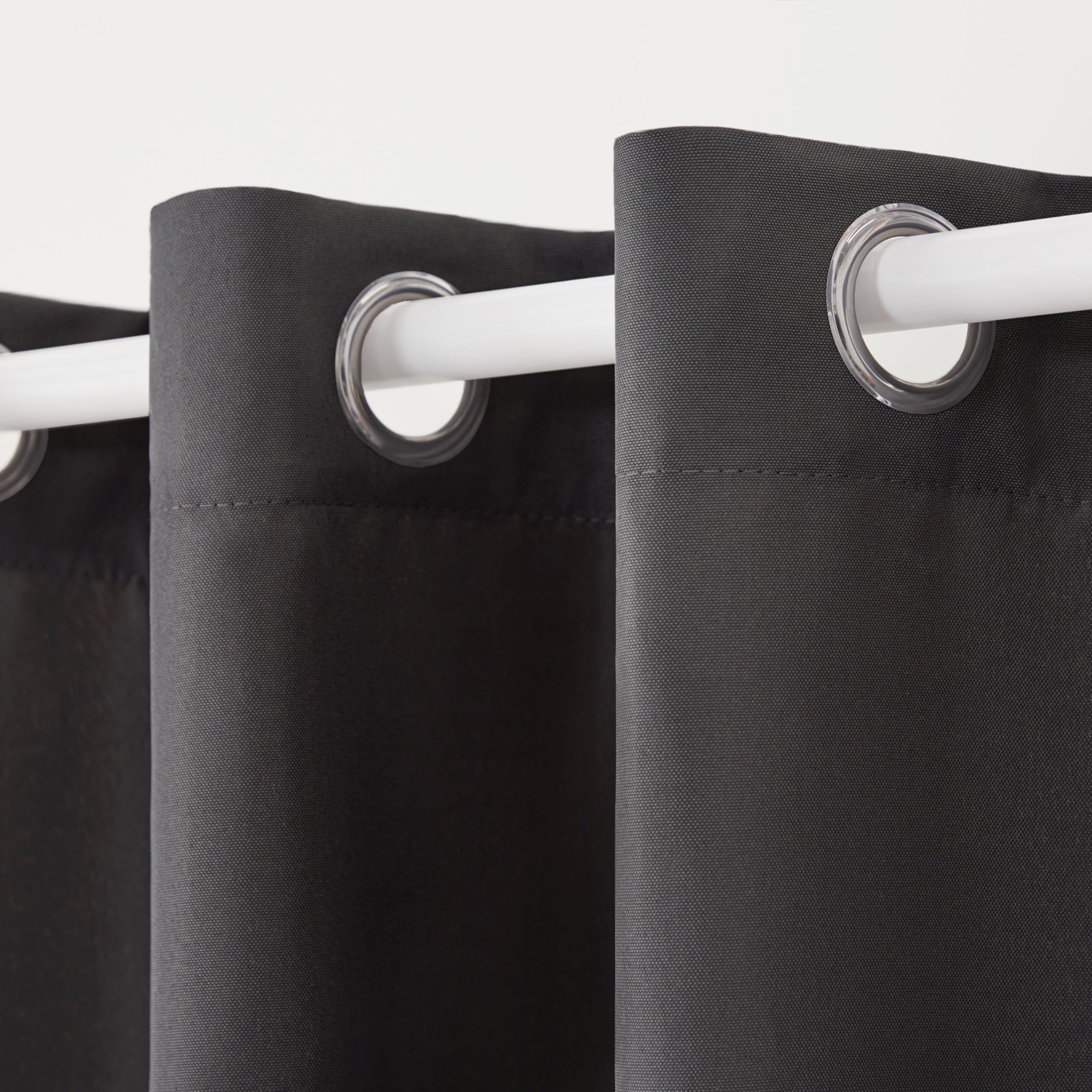 TOWN & COUNTRY BASICS close-up of stainless steel grommet for easy hanging and rust resistance