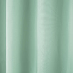 TOWN & COUNTRY BASICS panels hung on patio rod demonstrating outdoor use and privacy