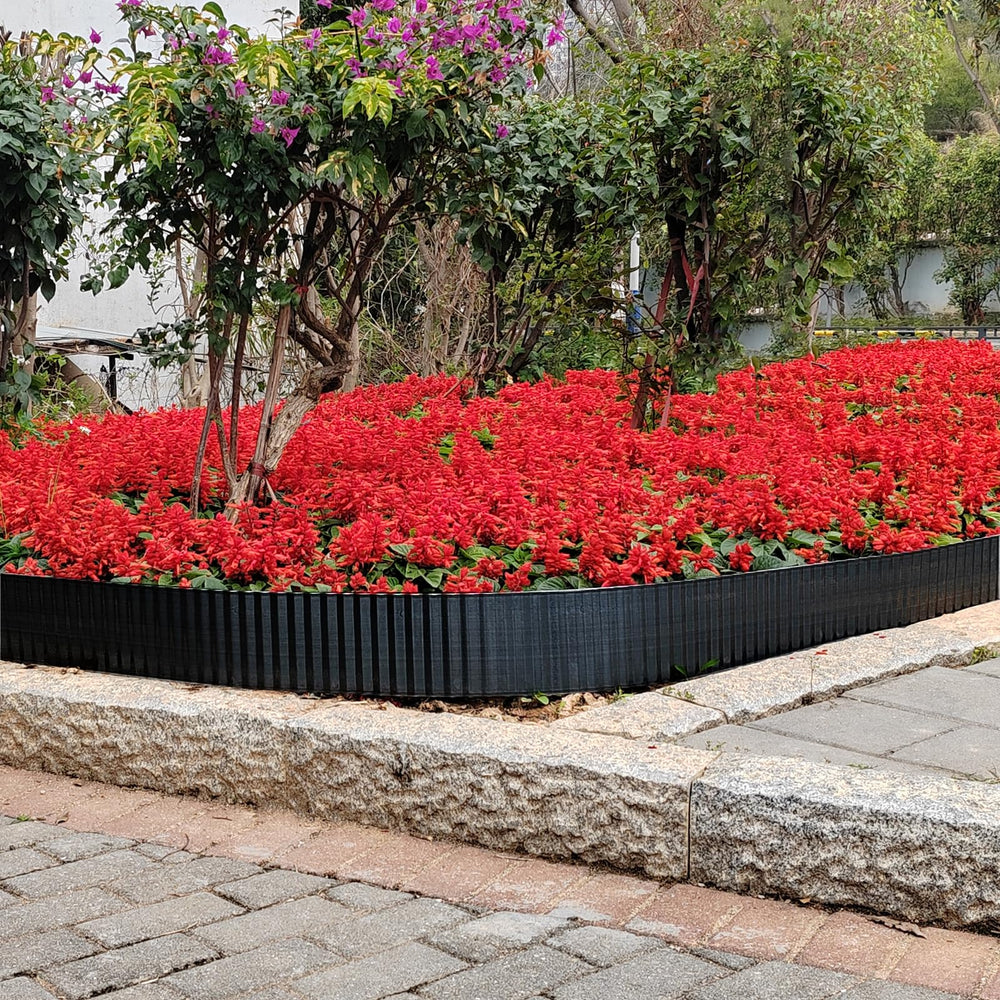 TPNEMGF installed between lawn and flower bed demonstrating containment and neat border benefit