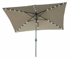 Trademark Innovations canopy with 26 LEDs lit at dusk providing ambient evening lighting benefit