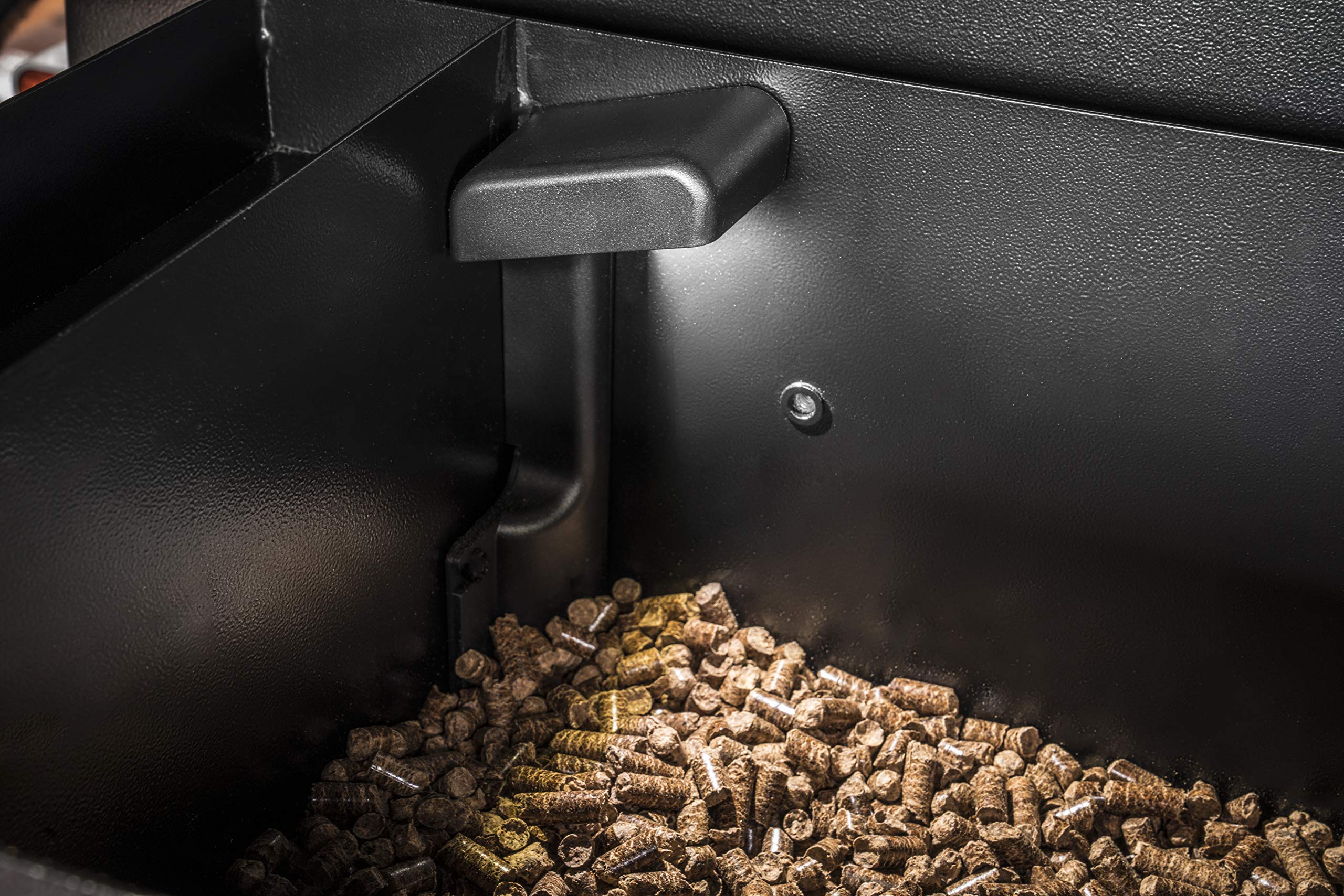 Traeger BAC523 being installed into hopper, showing ease of fit and compatibility
