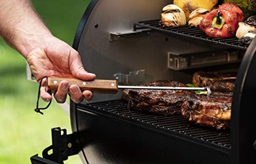 Traeger pig tail hanging storage on grill hook for convenient access