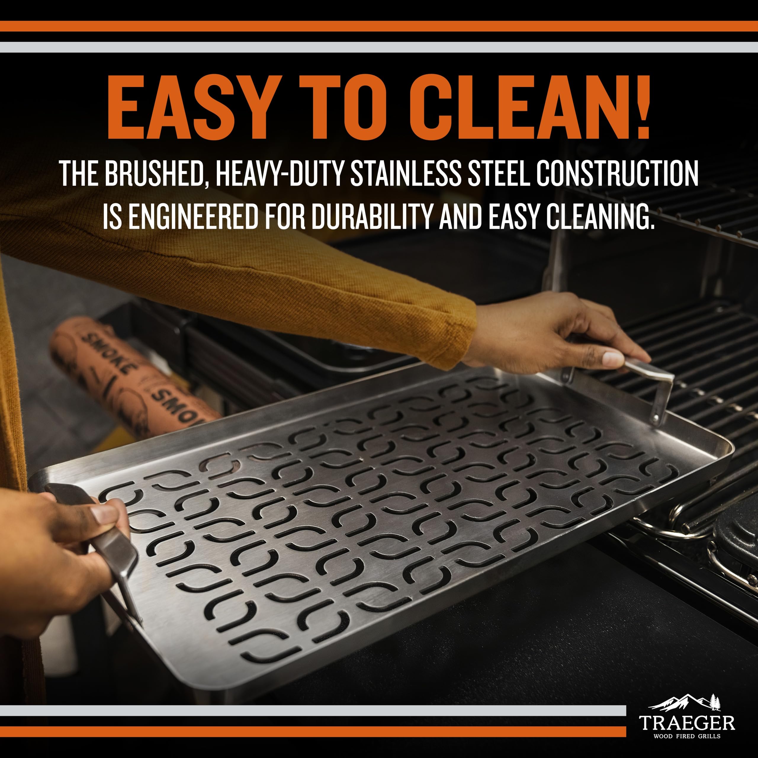 Traeger tray handles detail for safe lifting and precise placement benefit