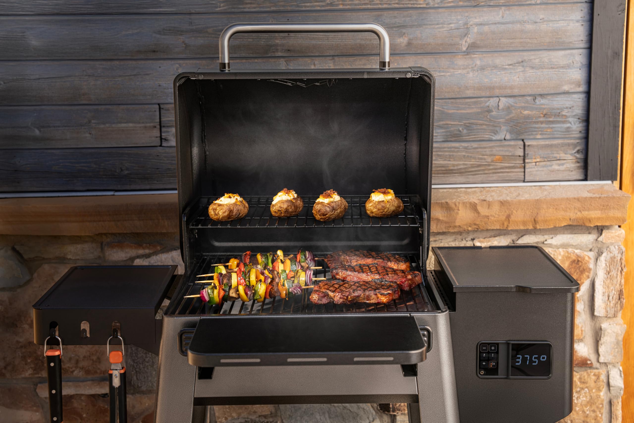 Traeger Westwood in backyard cookout setting showcasing family-style entertaining