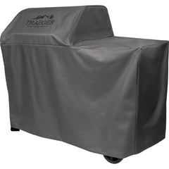 Traeger cover with tools and P.A.L. rails visible showing organized accessory accommodation