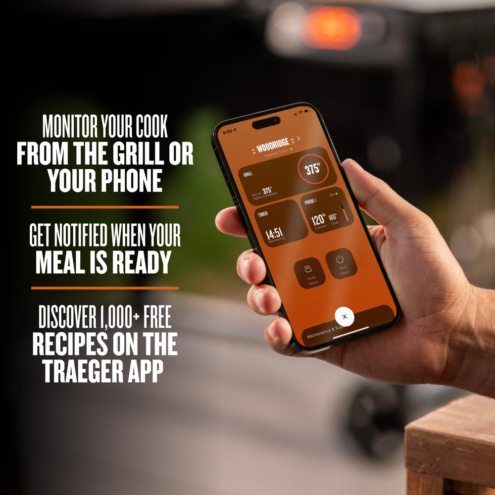 Traeger Woodridge pellet hopper with hardwood pellets emphasizing authentic wood flavor