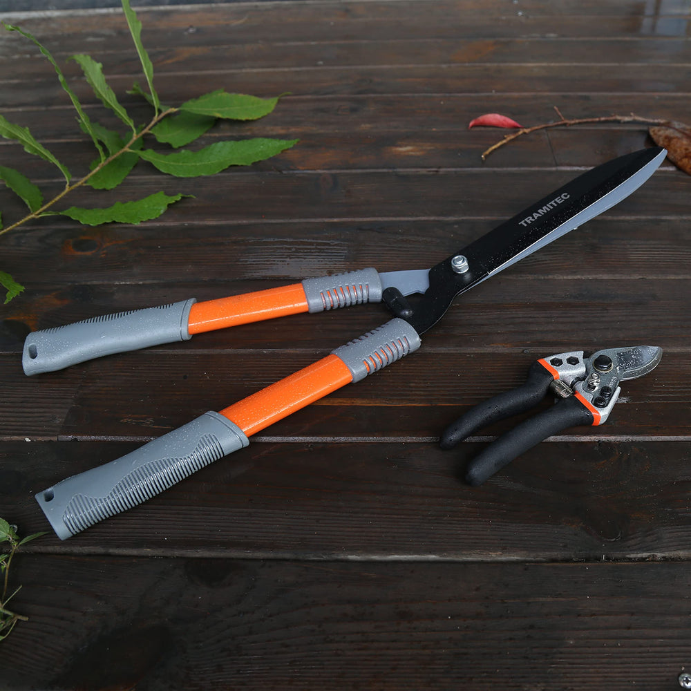 TRAMITEC shears next to ruler showing 21-inch reach advantage
