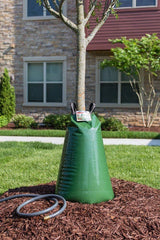 treegator installed around a tree trunk demonstrating deeper root watering