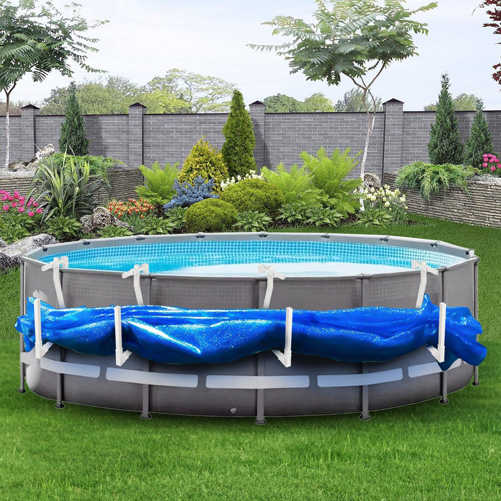 Treerit hooks in backyard pool scene making cover removal simple and tidy