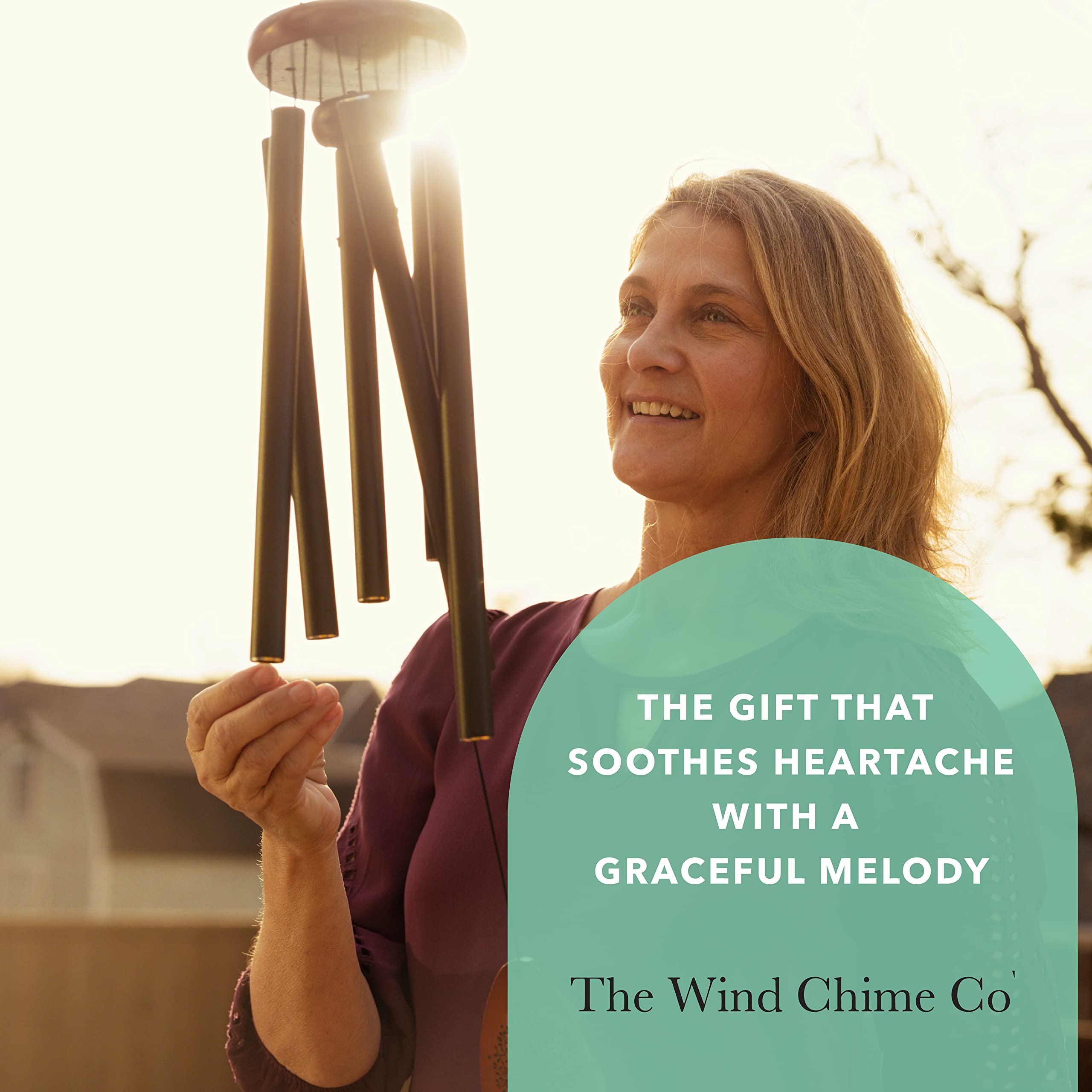 Trend Jockey wind chime hanging on porch creating calm outdoor ambience
